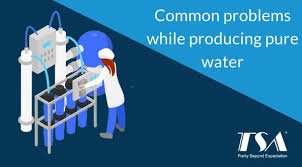 Technician checking pure water production system in pharma plant